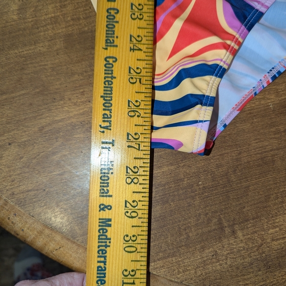 Vibrant Red and Blue One Piece with Artistic Swirls - Picture 2 of 7